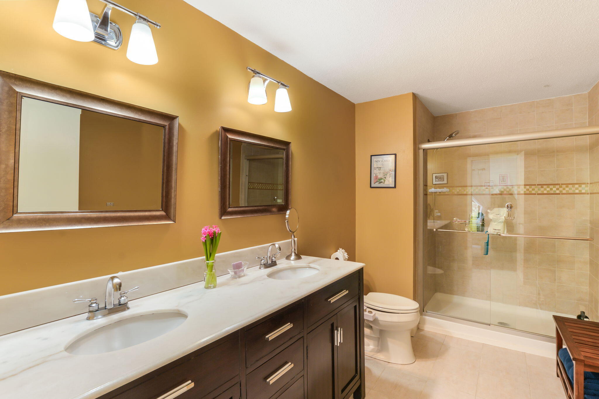 4 Riverview Avenue, Unit G Mashpee, MA 02649 - Photo 21 of 39 a bathroom with a double vanity sink toilet and shower