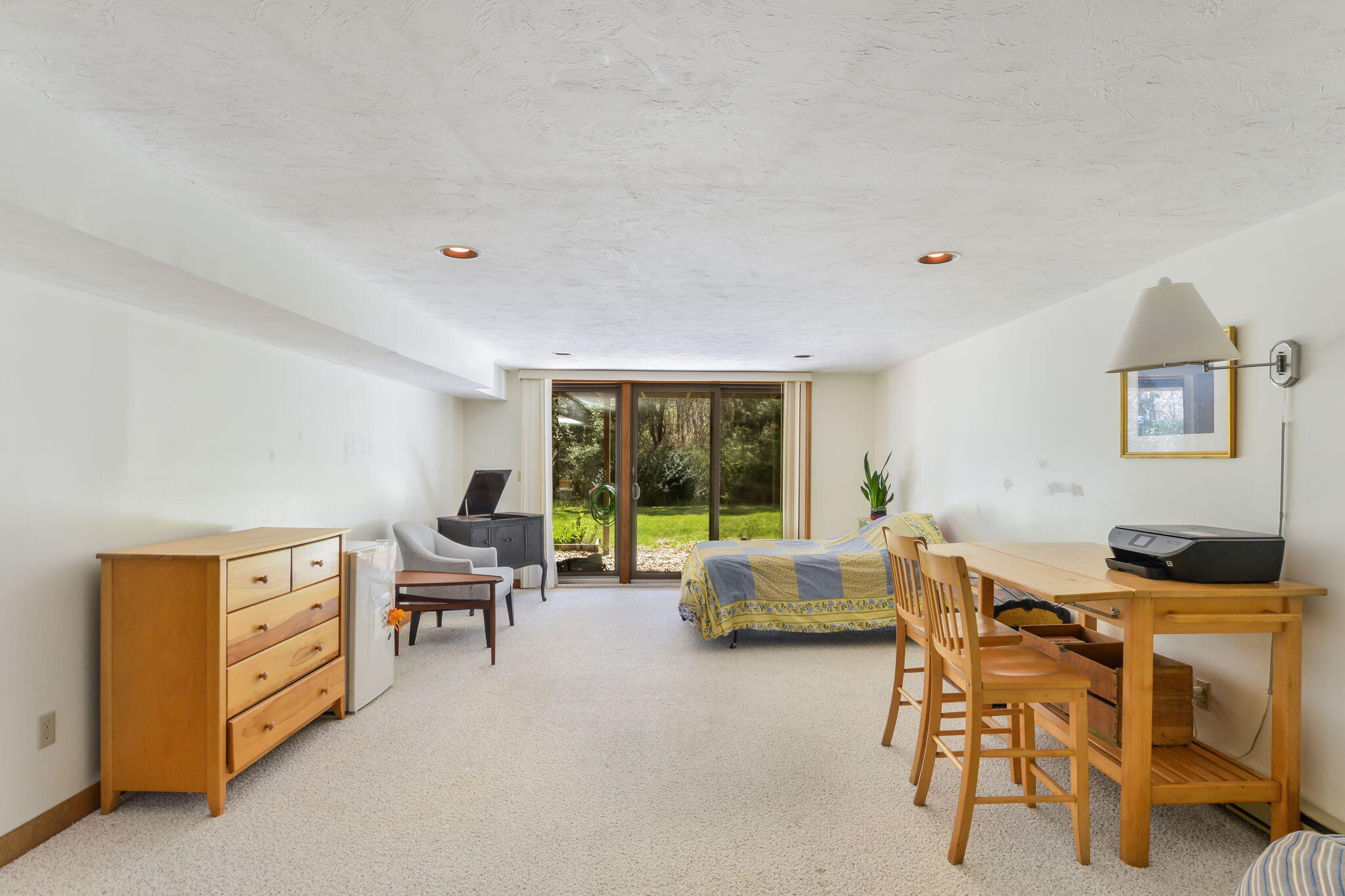 4 Riverview Avenue, Unit G Mashpee, MA 02649 - Photo 25 of 39 a living room with furniture and a large window