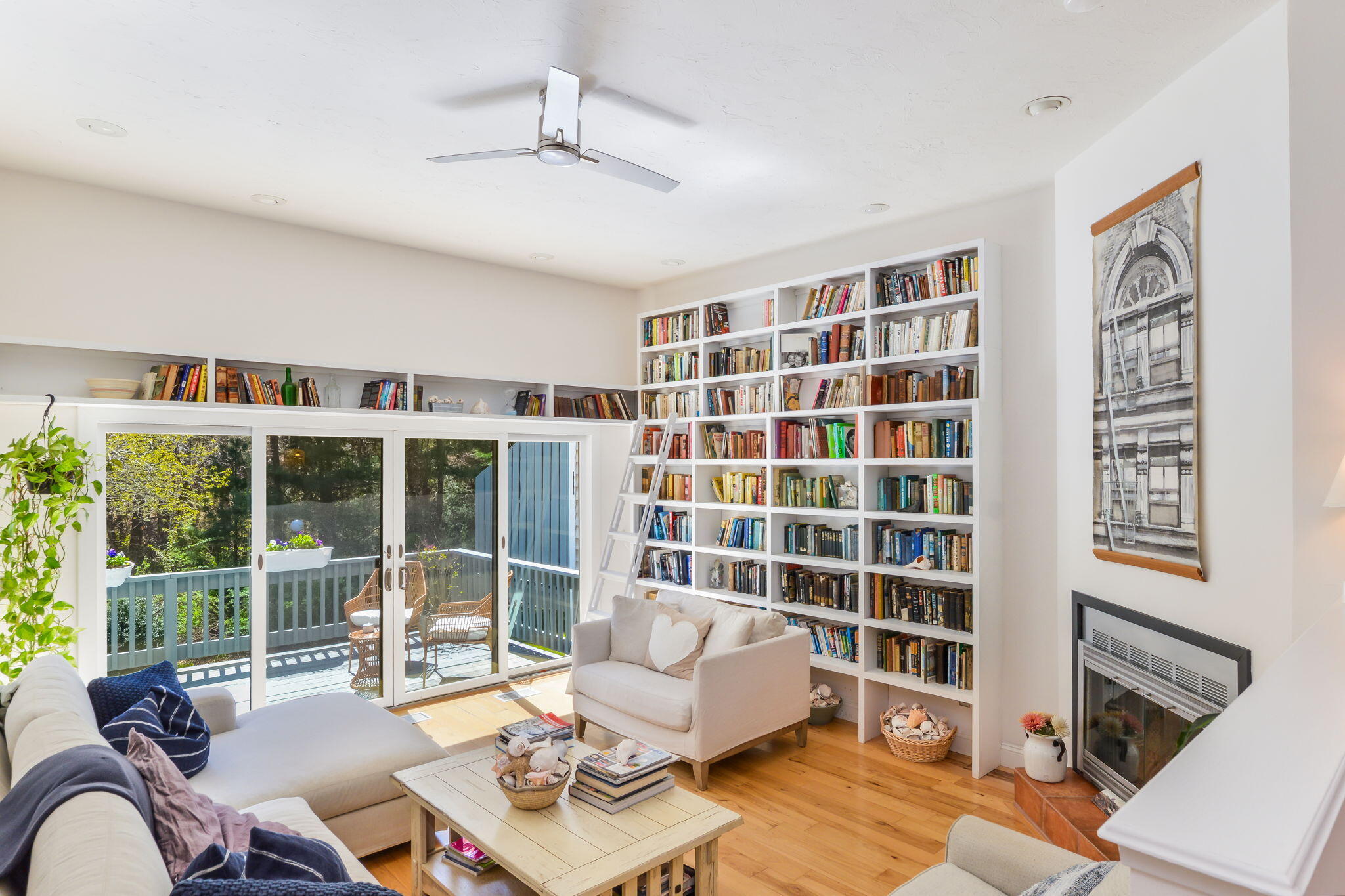 4 Riverview Avenue, Unit G Mashpee, MA 02649 - Photo 10 of 39 a living room with furniture and floor to ceiling windows