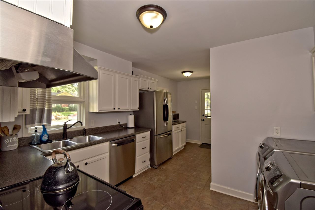 1065 Ivy Road Memphis, TN 38117 - Photo 11 of 20 a kitchen with a sink appliances and cabinets