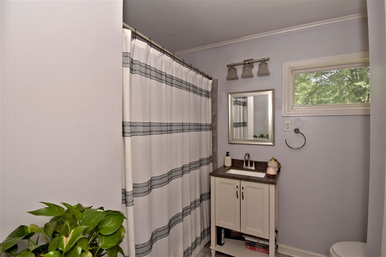 1065 Ivy Road Memphis, TN 38117 - Photo 15 of 20 a kitchen with a refrigerator and a window