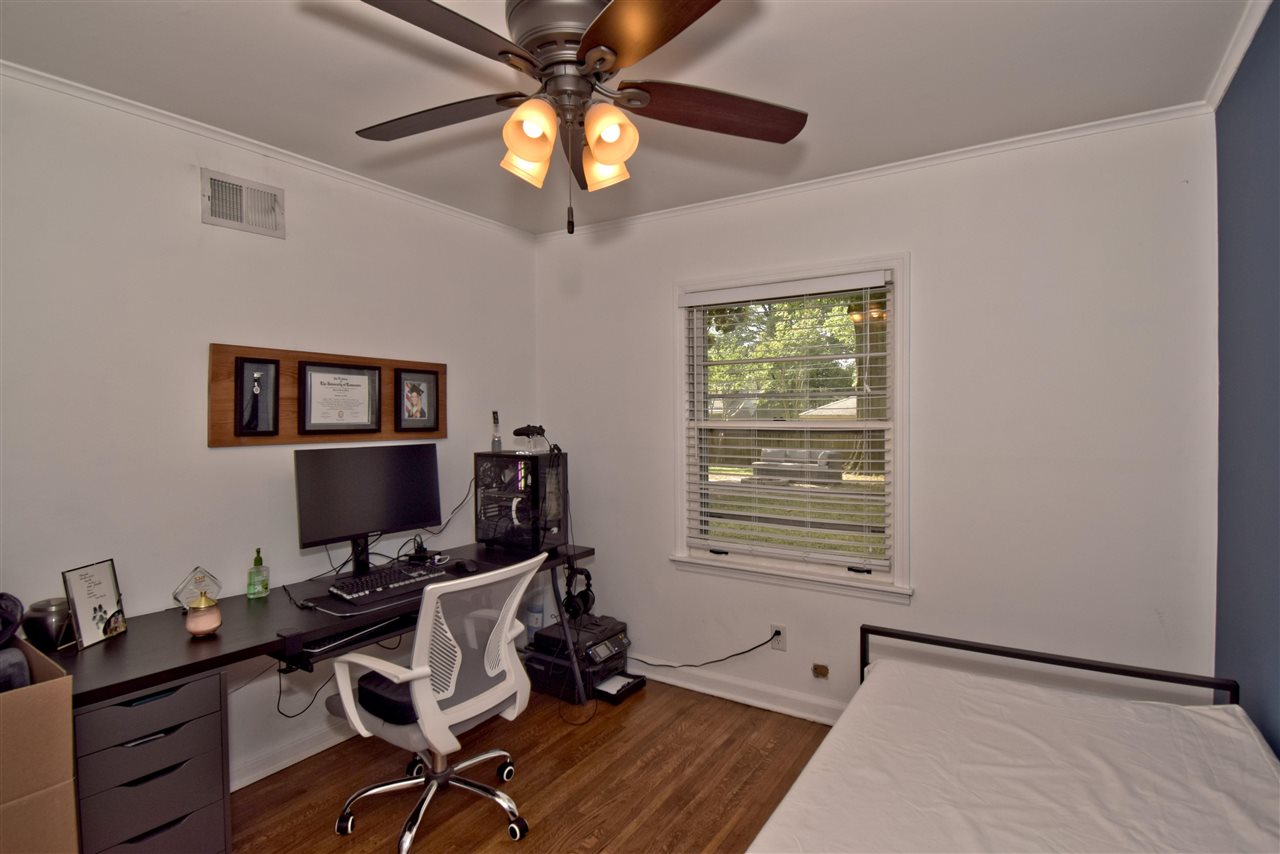 1065 Ivy Road Memphis, TN 38117 - Photo 16 of 20 a view of a workspace with furniture and a window