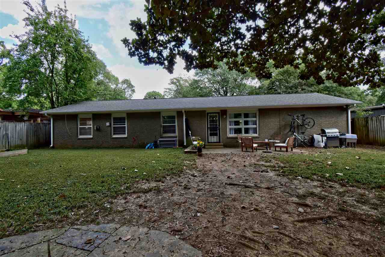 1065 Ivy Road Memphis, TN 38117 - Photo 17 of 20 a front view of a house with a yard