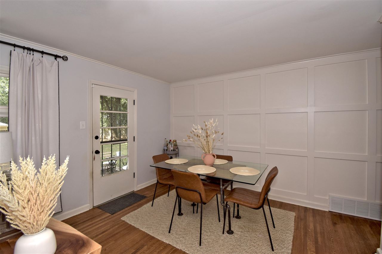 1065 Ivy Road Memphis, TN 38117 - Photo 7 of 20 a view of a dining room with furniture and window