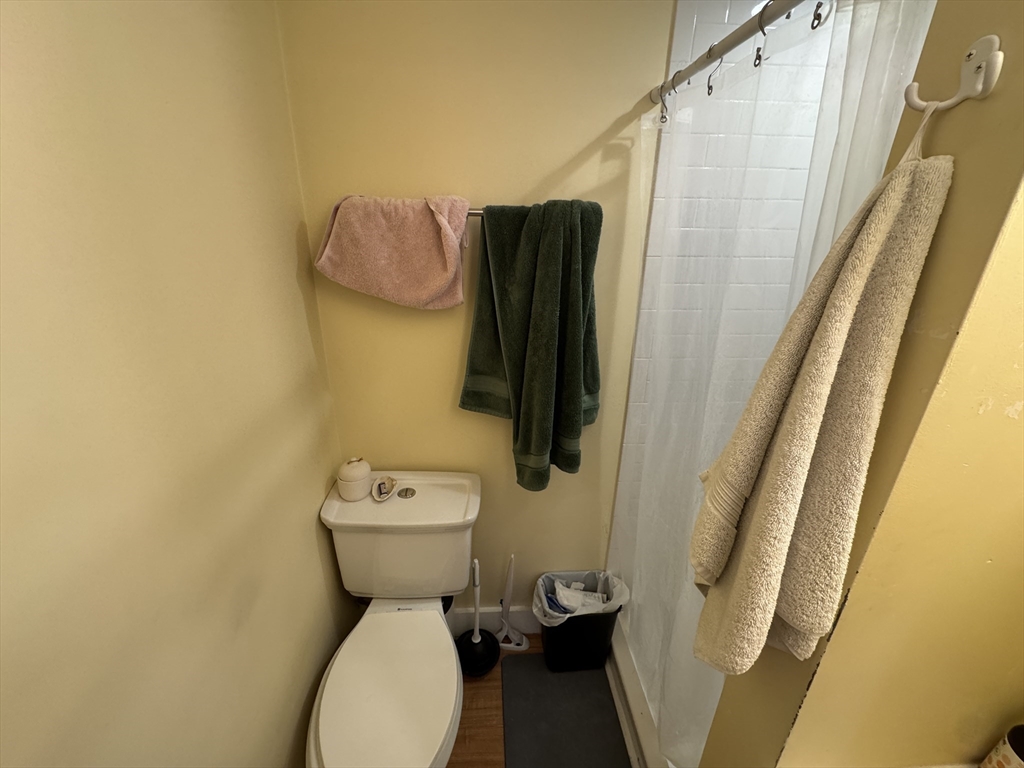 5 Blake Street, Unit 4 Cambridge, MA 02140 - Photo 14 of 14 a bathroom with a toilet and a sink