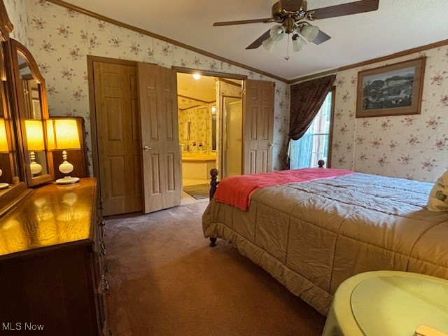 12575 Zane Road Lore City, OH 43755 - Photo 32 of 37 Bedroom featuring ornamental molding, wallpapered walls, carpet flooring, lofted ceiling, and connected bathroom