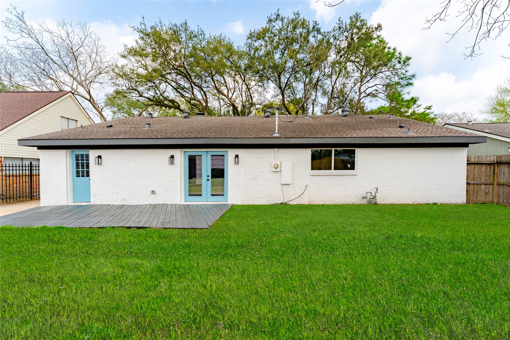 6027 Valkeith Drive Houston, TX 77096 - Photo 31 of 31 a front view of a house with a yard and garage