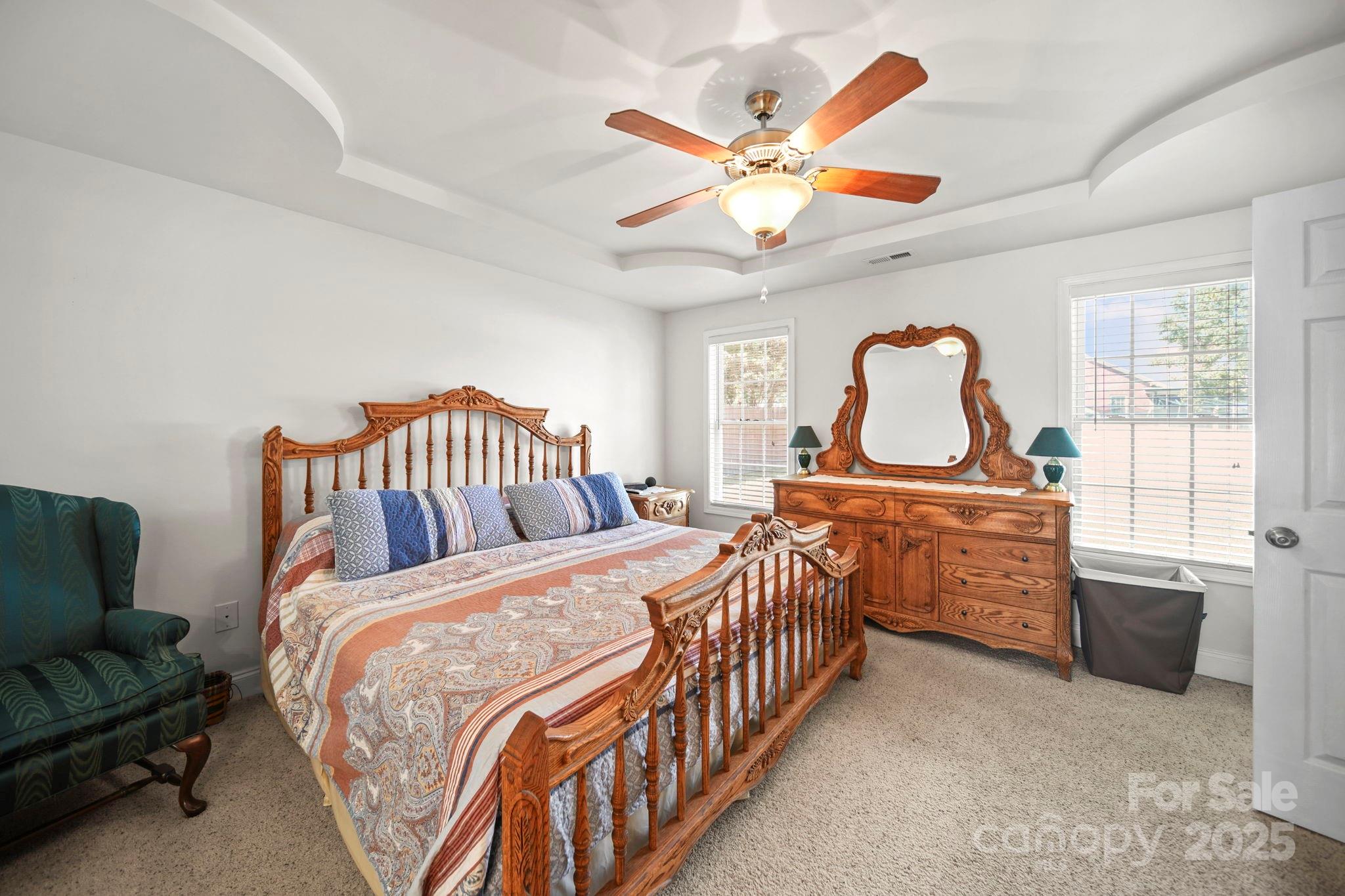 209 Lagoda Drive Locust, NC 28097 - Photo 24 of 43 a bedroom with bed and windows