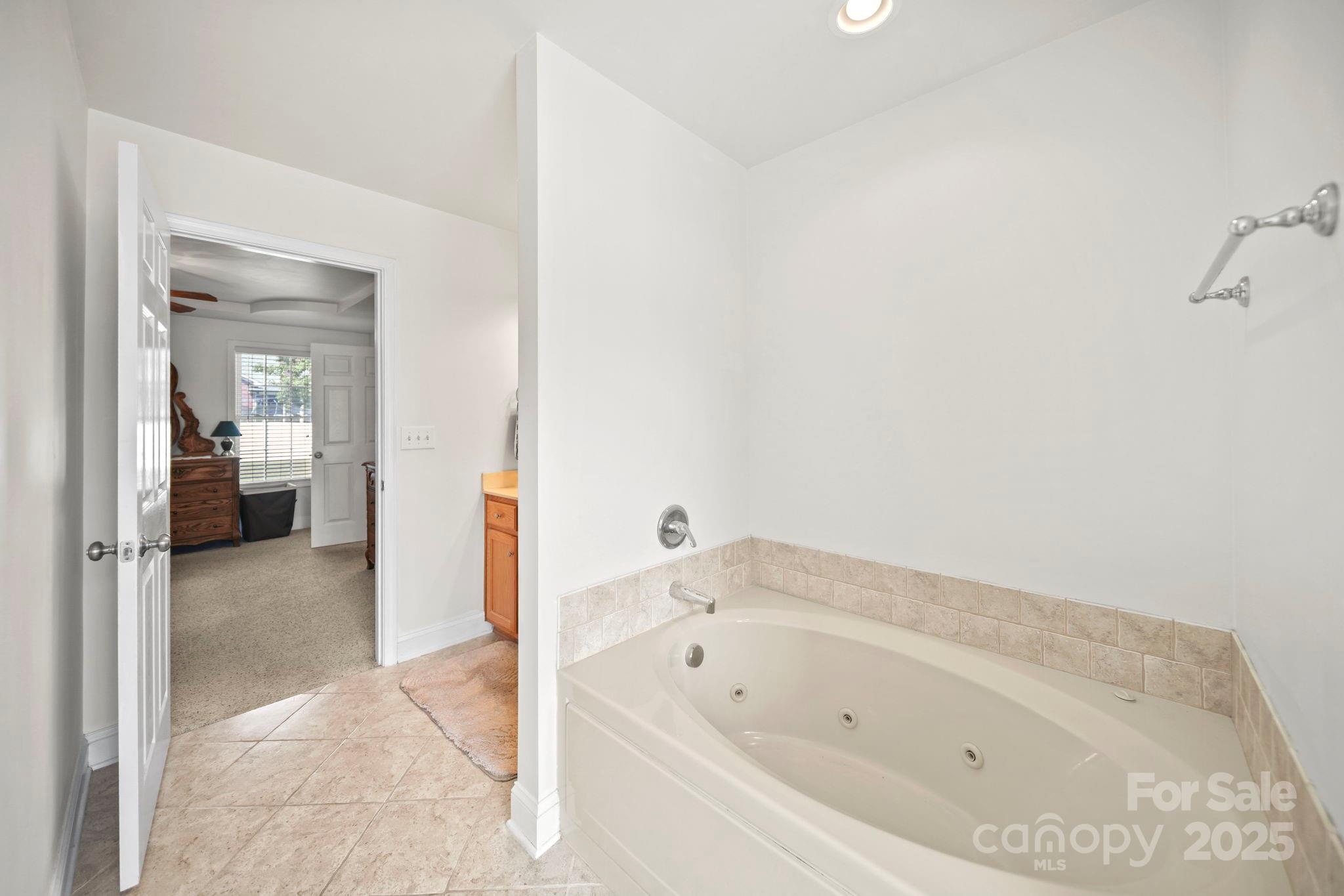 209 Lagoda Drive Locust, NC 28097 - Photo 27 of 43 a bathroom with a bathtub