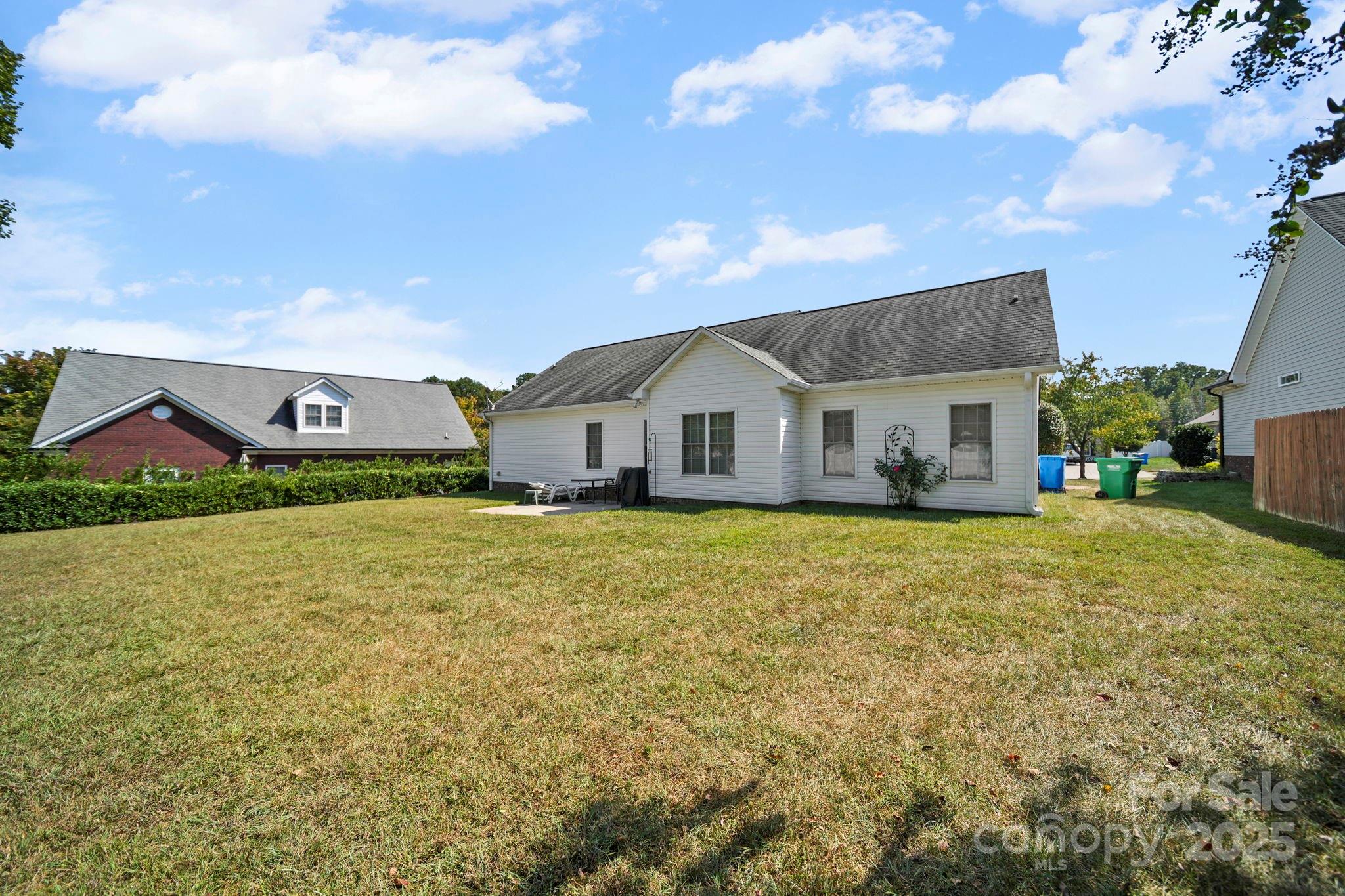 209 Lagoda Drive Locust, NC 28097 - Photo 7 of 43 a view of a house with a backyard