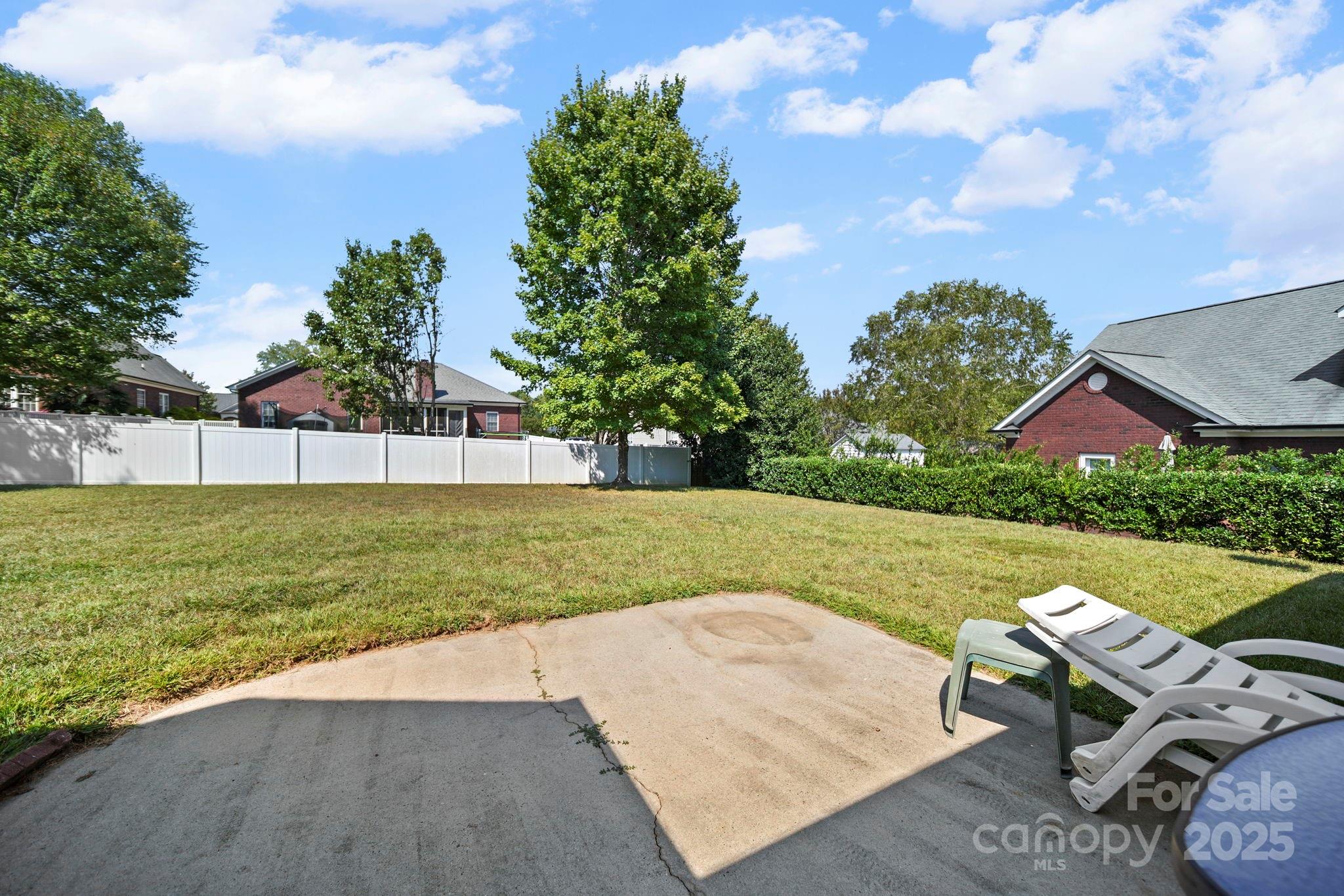 209 Lagoda Drive Locust, NC 28097 - Photo 9 of 43 a view of an house with backyard space and garden