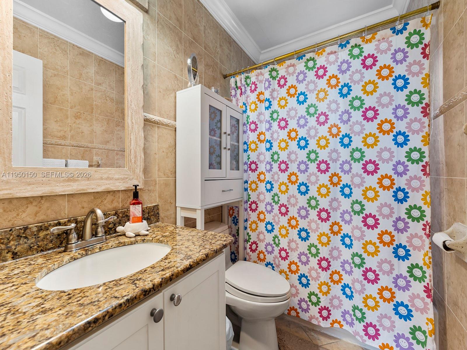 13821 Southwest 102nd Terrace Miami, FL 33186 - Photo 16 of 24 a bathroom with a sink toilet and shower