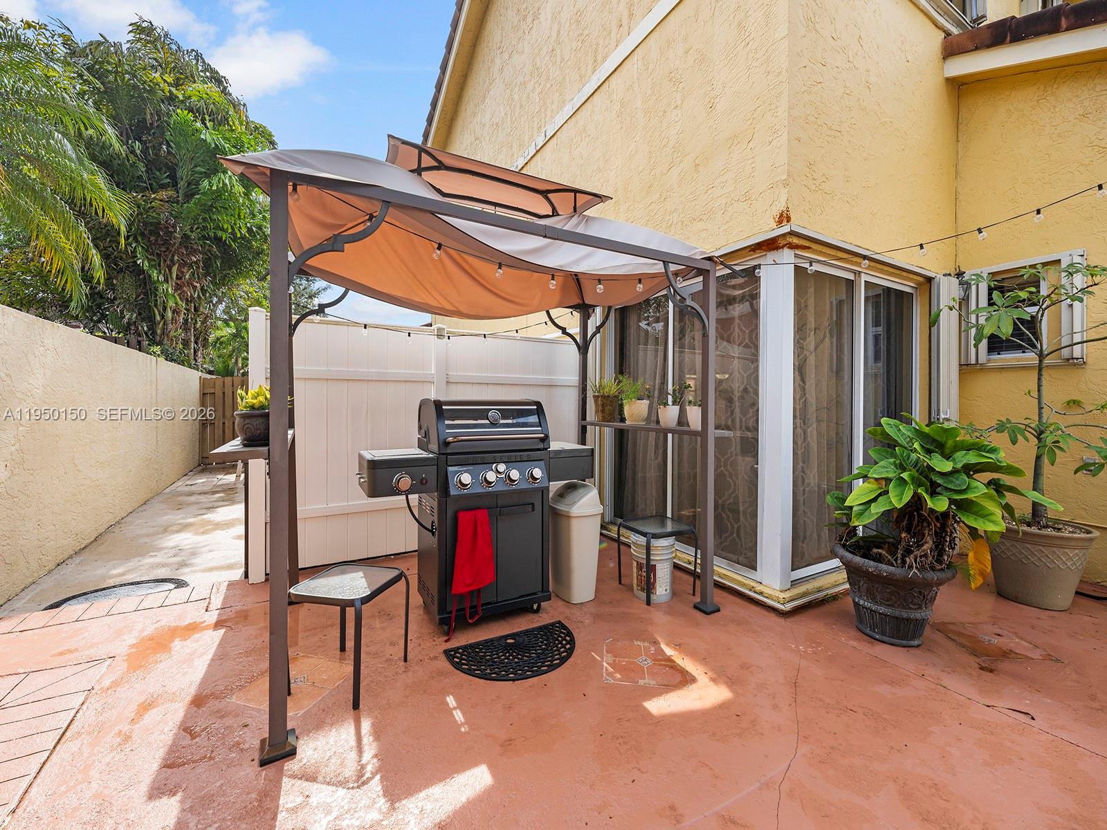 13821 Southwest 102nd Terrace Miami, FL 33186 - Photo 20 of 24 a view of outdoor space with seating area