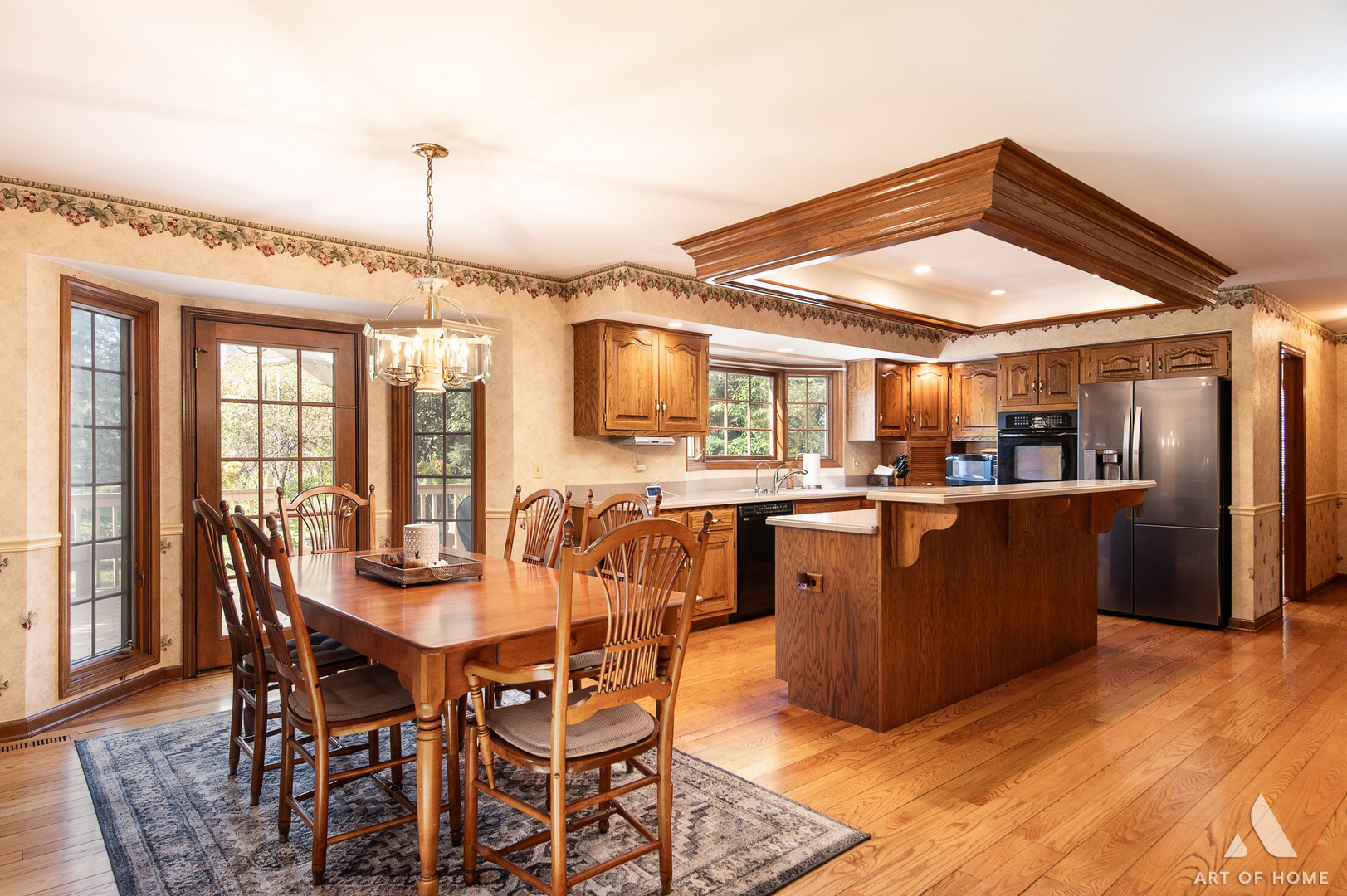3112 Turnberry Road St. Charles, IL 60174 - Photo 17 of 77 a dining room with a wooden table and chairs