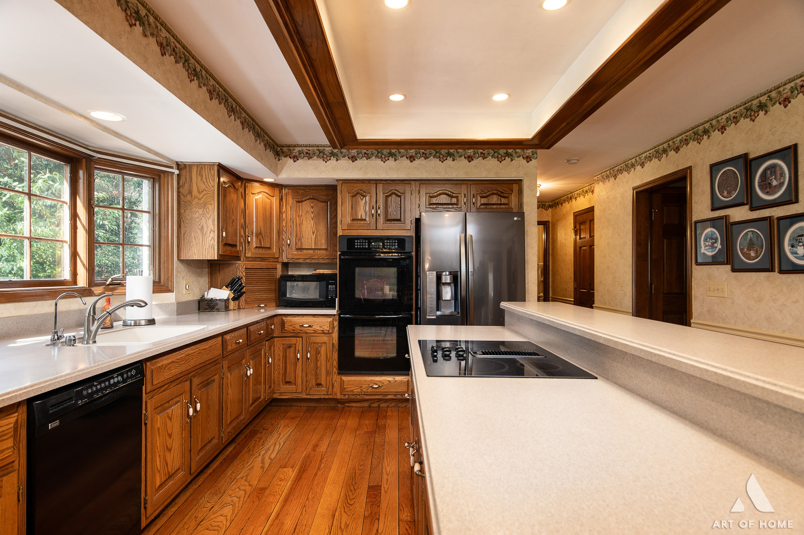 3112 Turnberry Road St. Charles, IL 60174 - Photo 19 of 77 a large kitchen with stainless steel appliances kitchen island granite countertop a sink and cabinets