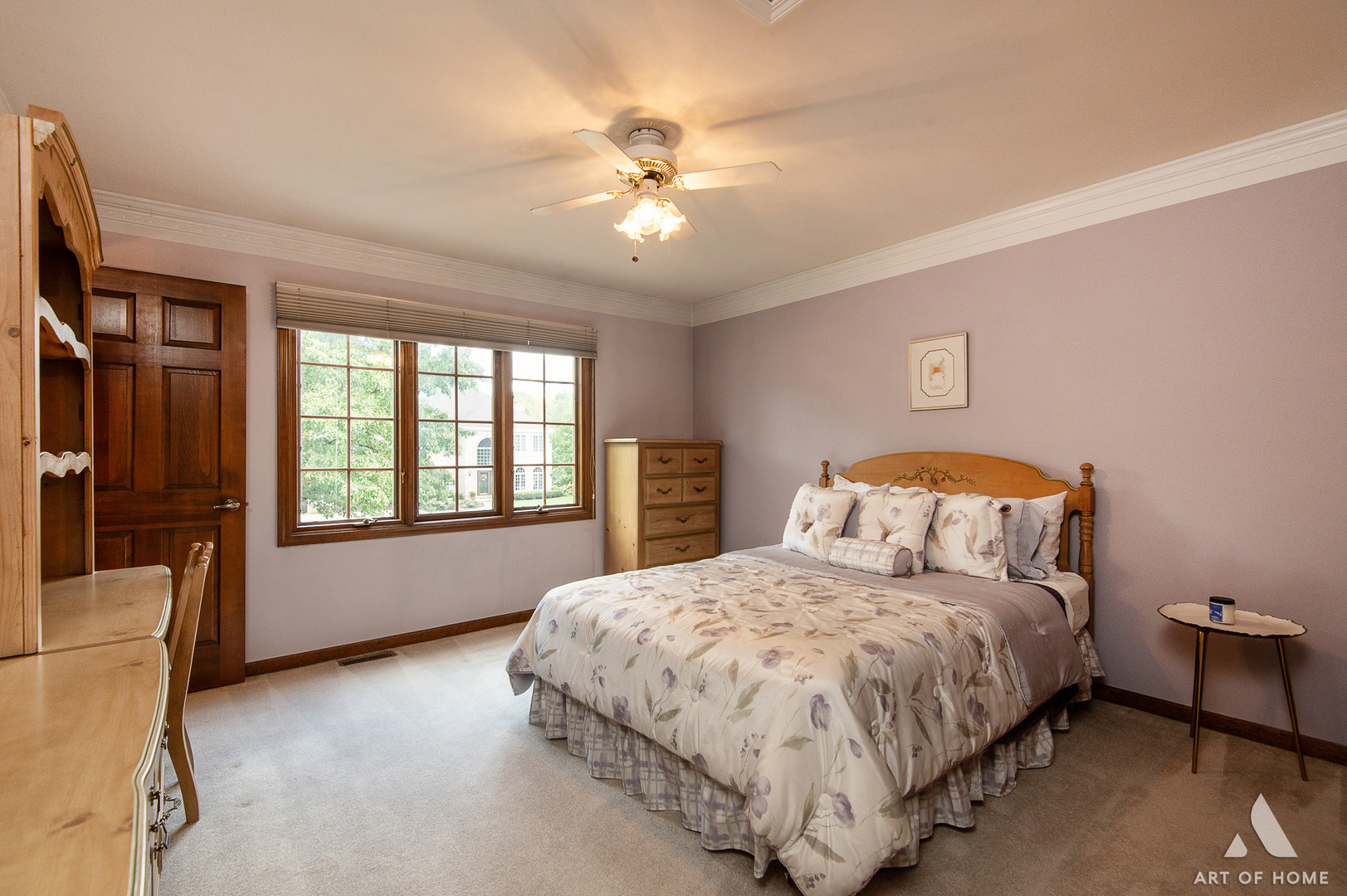 3112 Turnberry Road St. Charles, IL 60174 - Photo 50 of 77 a bedroom with a large bed and a chandelier