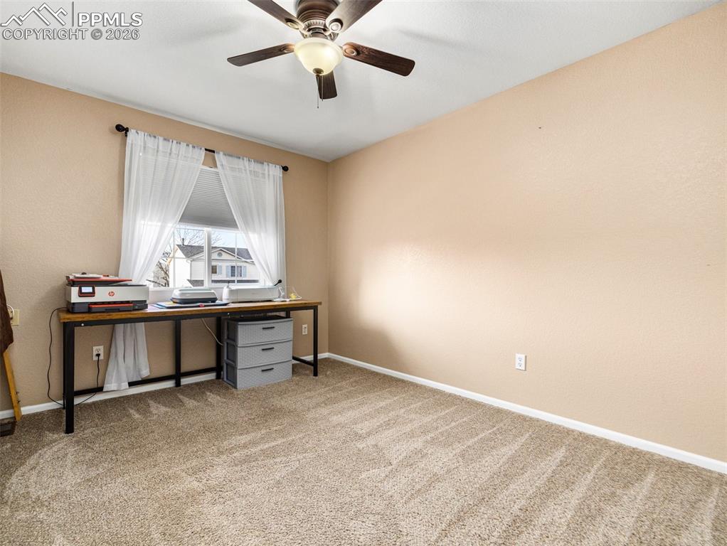5044 Landmark Road Pueblo, CO 81008 - Photo 13 of 25 a workspace with furniture and window