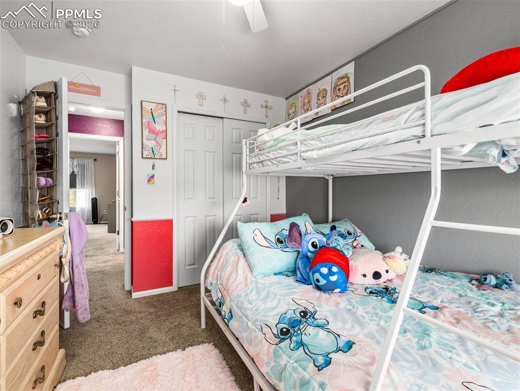 5044 Landmark Road Pueblo, CO 81008 - Photo 16 of 25 a bedroom with bed and a window