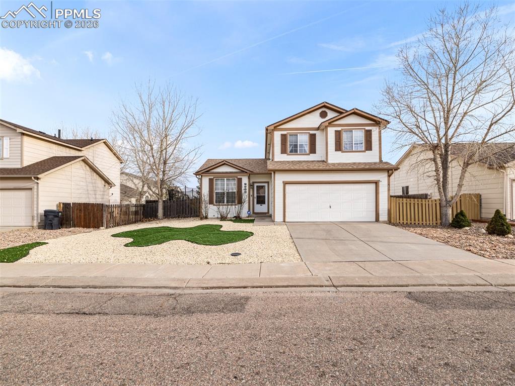 5044 Landmark Road Pueblo, CO 81008 - Photo 2 of 25 a view of front of house with a yard