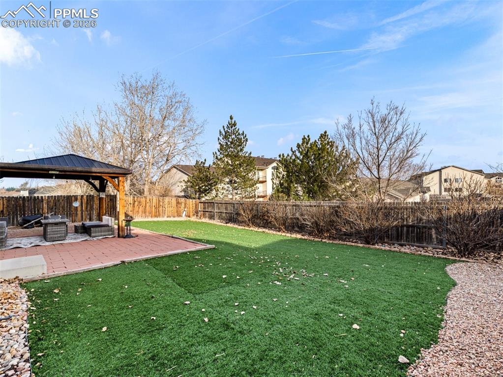 5044 Landmark Road Pueblo, CO 81008 - Photo 21 of 25 a view of a yard with patio