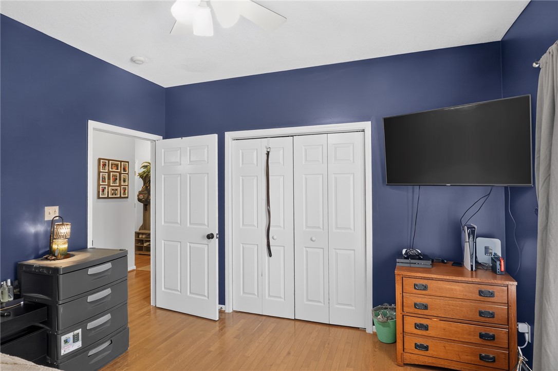 144 Elliott Circle Anderson, SC 29621 - Photo 18 of 30 Hardwood floors and a pristine ceiling fan elevate the comfort of this private sleeping area.