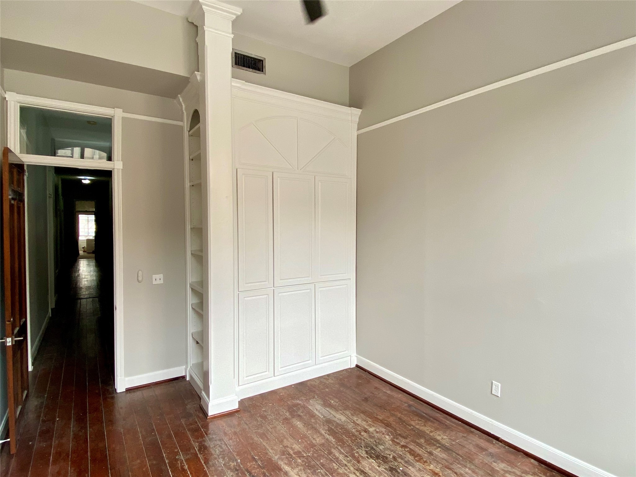 2319 The Strand, Unit 2A Galveston, TX 77550 - Photo 11 of 32 a view of an empty room with wooden floor
