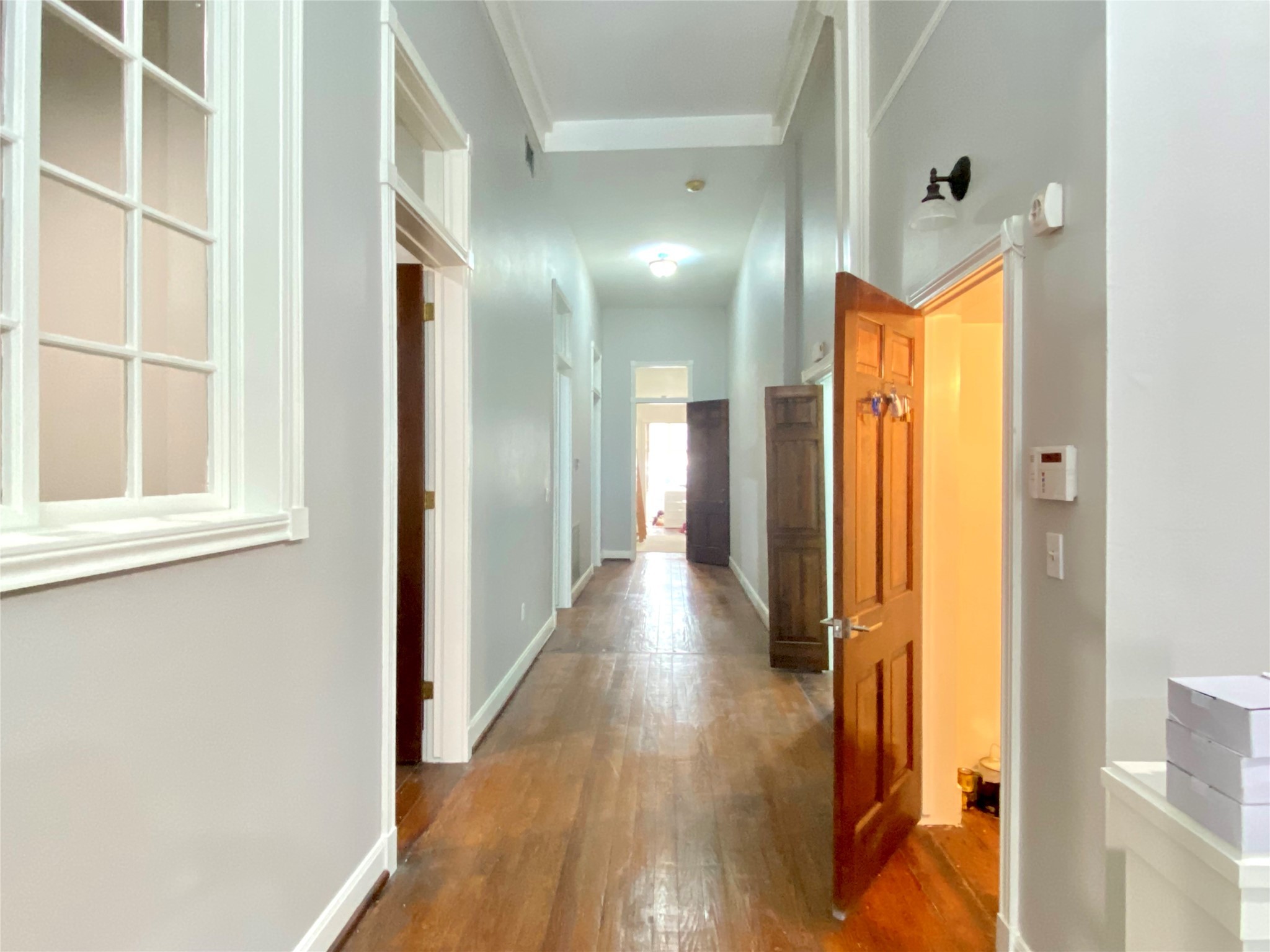 2319 The Strand, Unit 2A Galveston, TX 77550 - Photo 17 of 32 a view of gallery with wooden floor