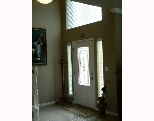 a view of a hallway with windows