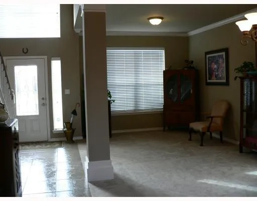 a view of livingroom with furniture and windows