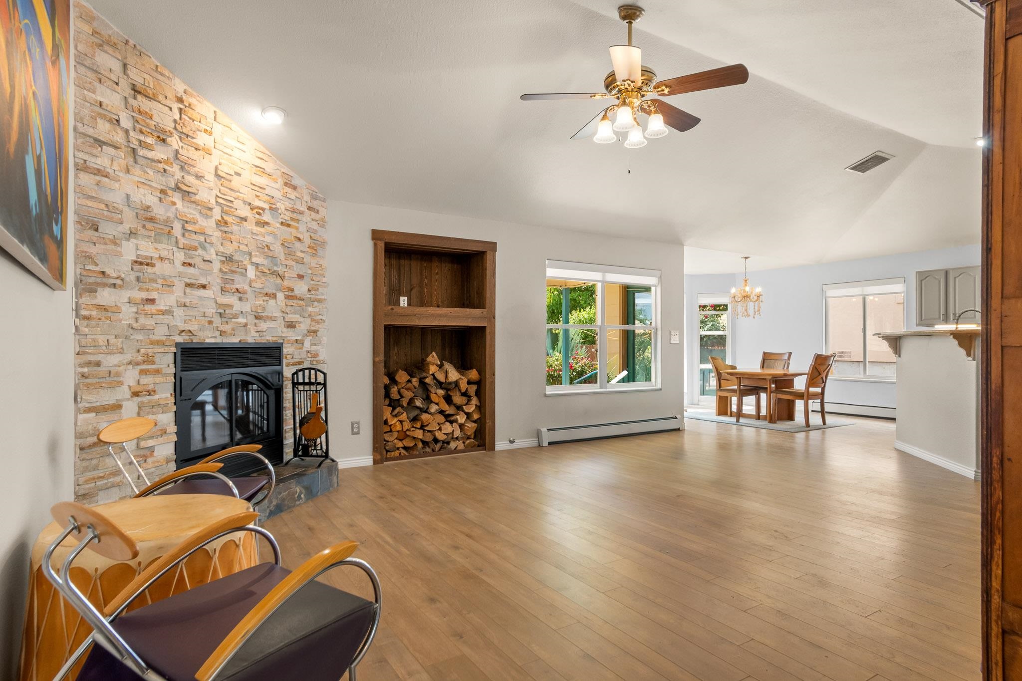398 Butte Court Grand Junction, CO 81507 - Photo 5 of 33 a room with furniture and a fireplace