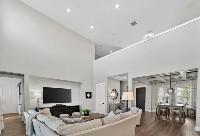 a kitchen with a refrigerator and a sink