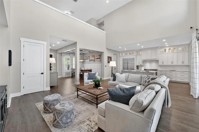 a kitchen with stainless steel appliances granite countertop a sink and a stove