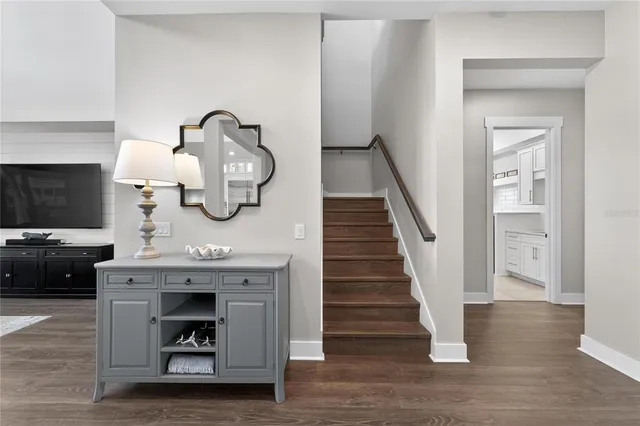 a view of a patio with a table and chairs