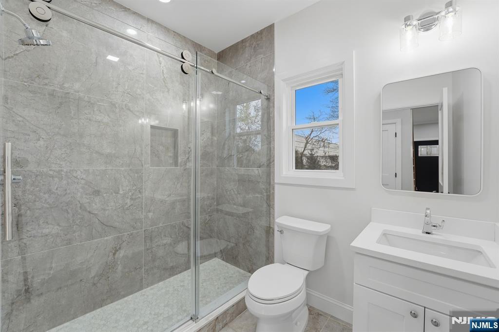 20 Barnsdale Road Wayne, NJ 07470 - Photo 15 of 40 a bathroom with a sink toilet and shower