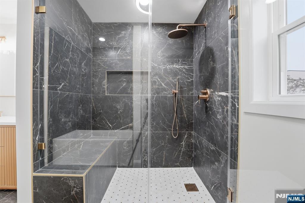 20 Barnsdale Road Wayne, NJ 07470 - Photo 24 of 40 a bathroom with a shower and a sink