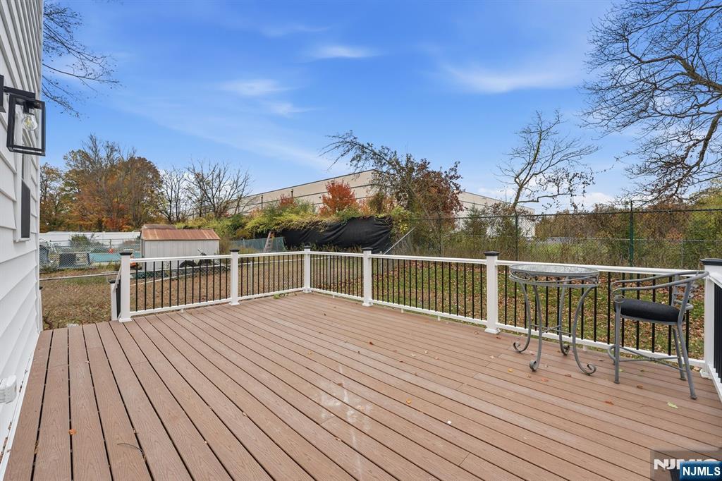 20 Barnsdale Road Wayne, NJ 07470 - Photo 34 of 40 a view of a balcony with wooden floor and fence