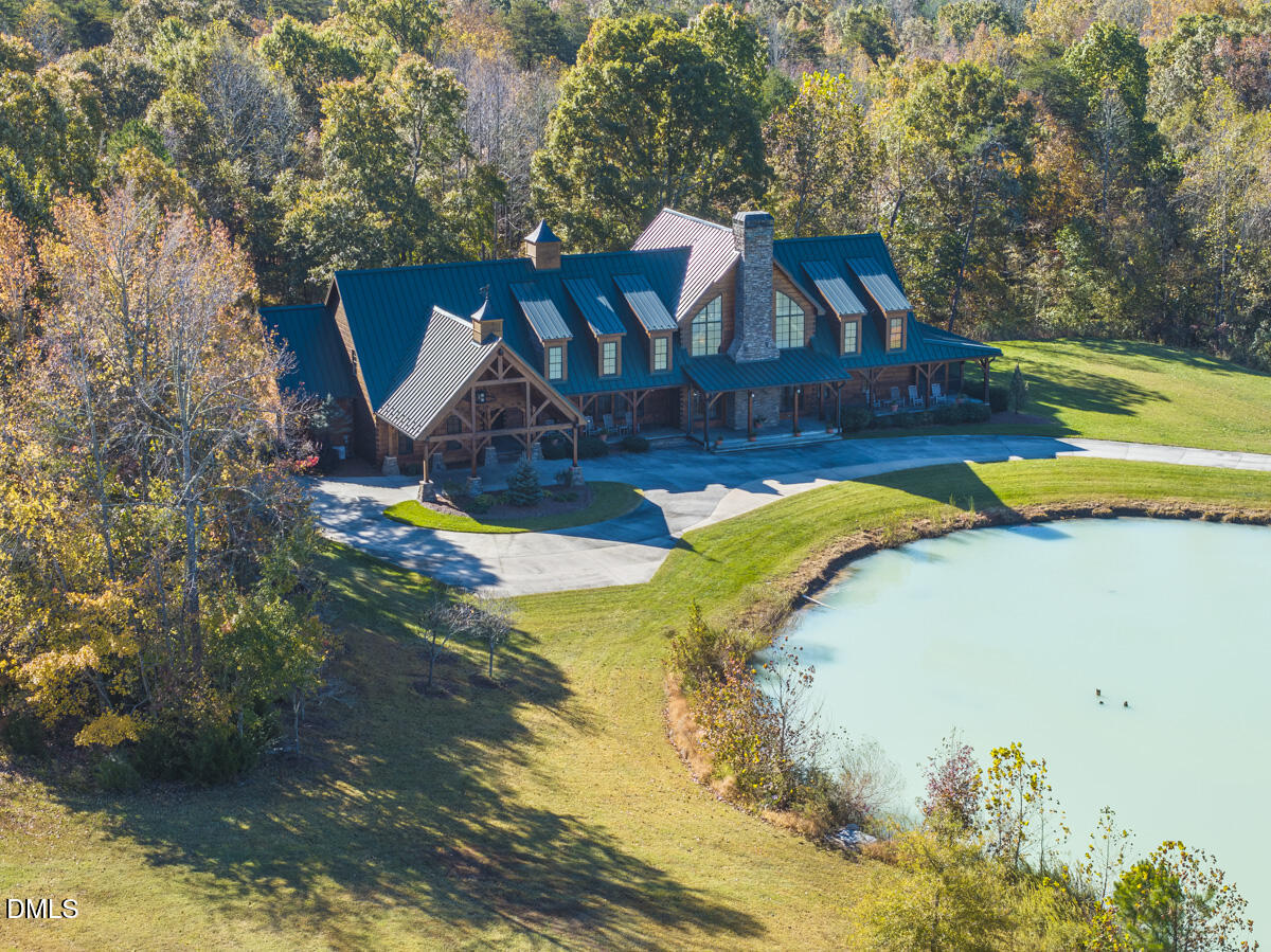 390 Line Creek Farm Road Yanceyville, NC 27379 - Photo 18 of 102 a view of swimming pool with a yard