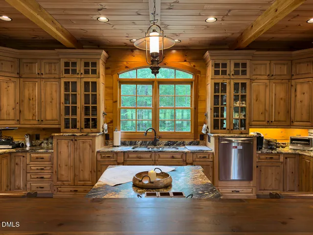 a view of a porch with furniture and a window