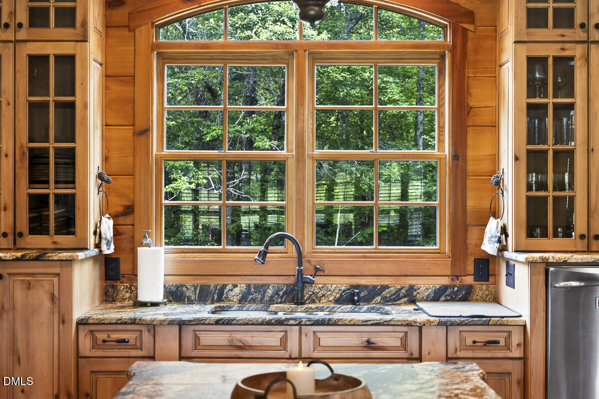 390 Line Creek Farm Road Yanceyville, NC 27379 - Photo 27 of 102 a view of a building and a window