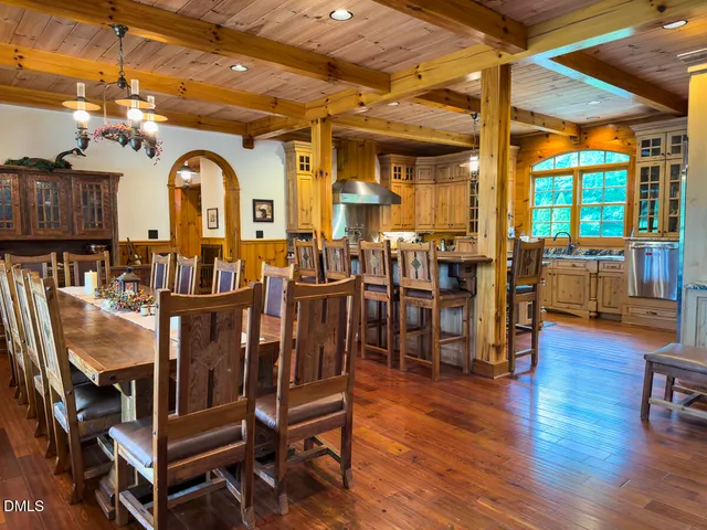 a bathroom with a shower and a glass door shower