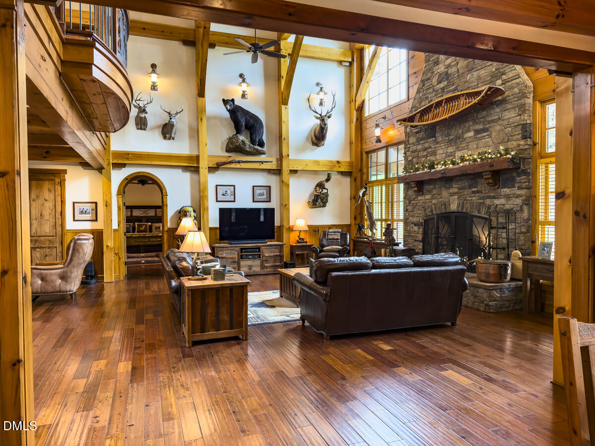390 Line Creek Farm Road Yanceyville, NC 27379 - Photo 30 of 102 a living room with furniture or couch and a fireplace