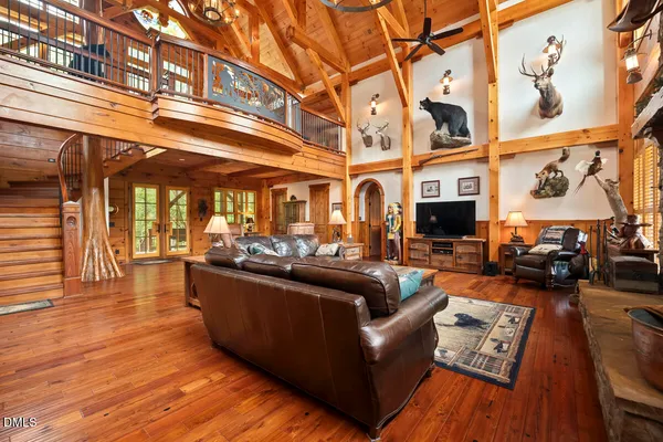 a bathroom with a shower and a glass door shower