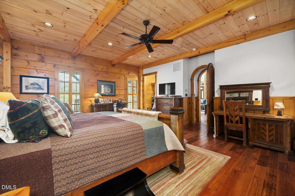 390 Line Creek Farm Road Yanceyville, NC 27379 - Photo 36 of 102 a bed room with a bed window and dresser