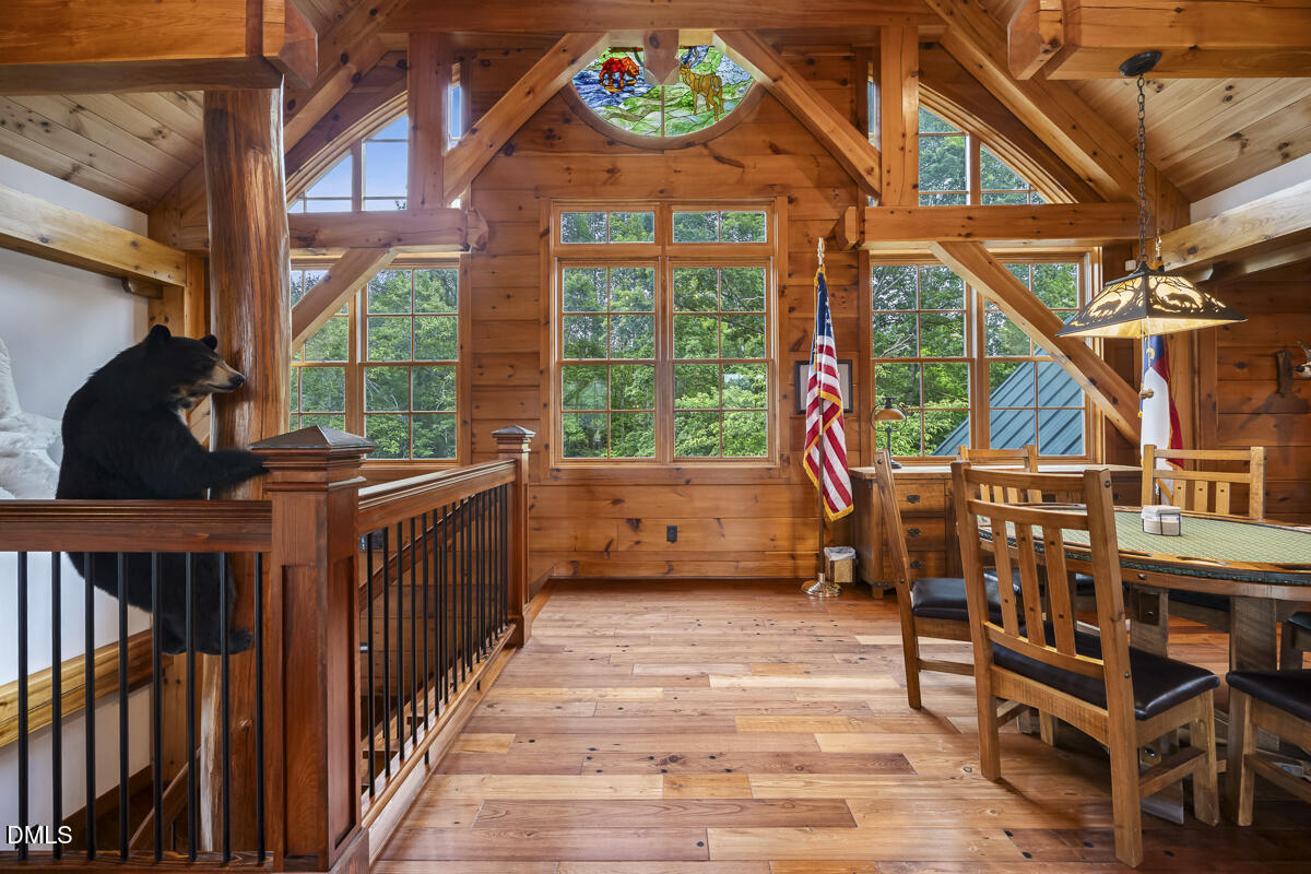 390 Line Creek Farm Road Yanceyville, NC 27379 - Photo 43 of 102 a view of a porch with furniture and a window