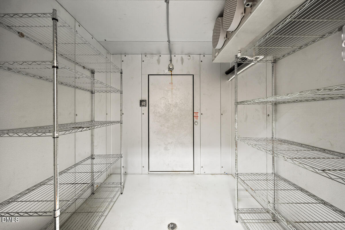 390 Line Creek Farm Road Yanceyville, NC 27379 - Photo 58 of 102 a bathroom with a shower and a glass door shower