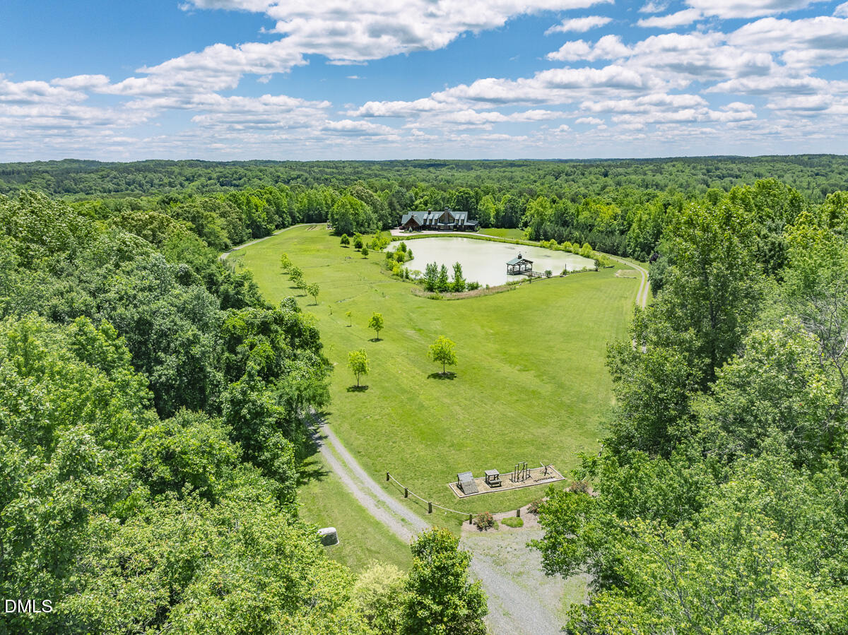 390 Line Creek Farm Road Yanceyville, NC 27379 - Photo 71 of 102 a view of a back yard