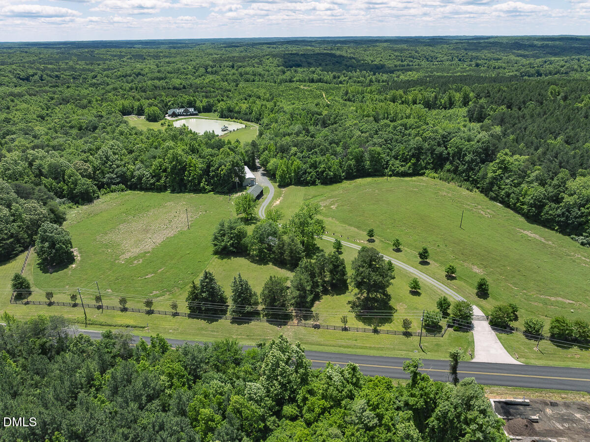 390 Line Creek Farm Road Yanceyville, NC 27379 - Photo 87 of 102 a view of a large garden