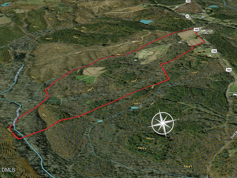 390 Line Creek Farm Road Yanceyville, NC 27379 - Photo 93 of 102 a view of a tree with a yard