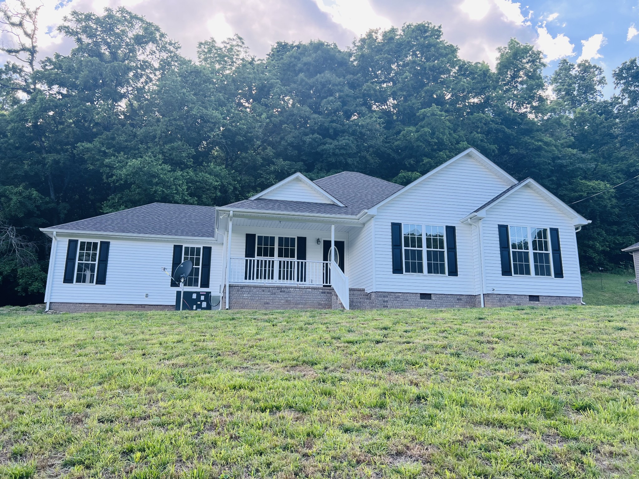 770 Bunker Hill Road Pulaski, TN 38478 - Photo 24 of 26 a front view of a house with a yard