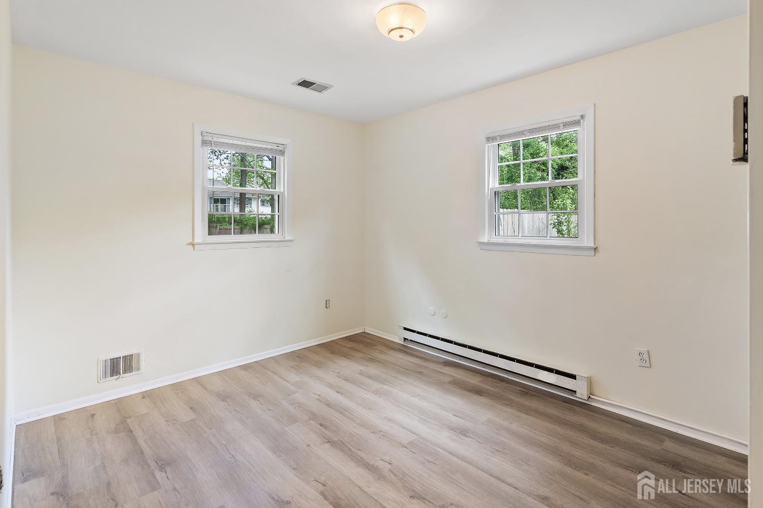 10 Woodruff Road Edison, NJ 08820 - Photo 14 of 18 an empty room with a window